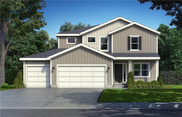 view of front of home featuring a garage and a front yard