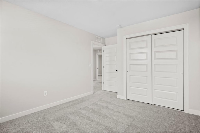1933 SW Merryman Dr, Lees Summit, MO 64082 - unfurnished bedroom featuring carpet floors, baseboards, and a closet