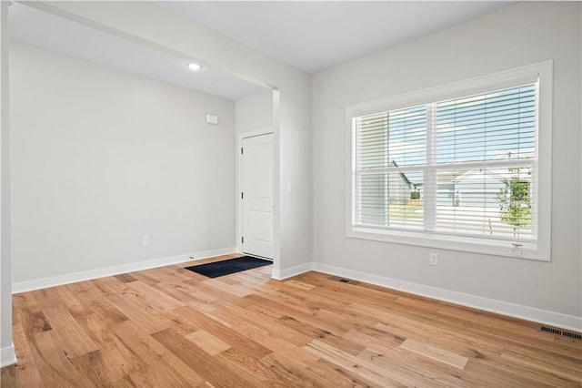 1933 SW Merryman Dr, Lees Summit, MO 64082 - spare room featuring light wood-type flooring, baseboards, and recessed lighting