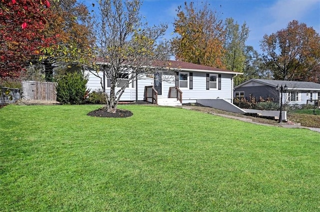 ranch-style house with a front yard