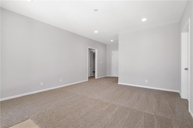 unfurnished room featuring carpet flooring