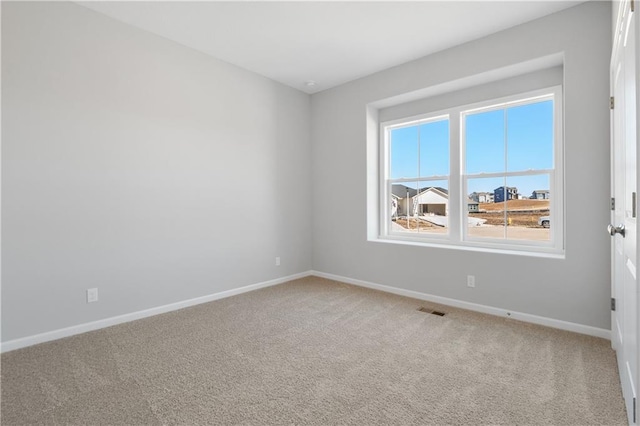 view of carpeted spare room