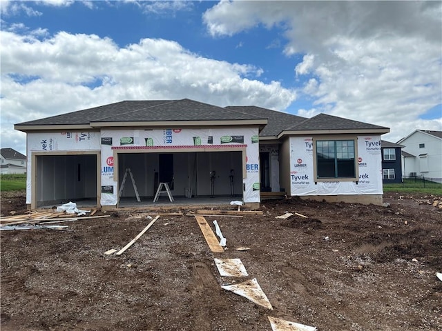 25275 W 148th Pl, Olathe, KS 66061 - property in mid-construction featuring a garage and roof with shingles
