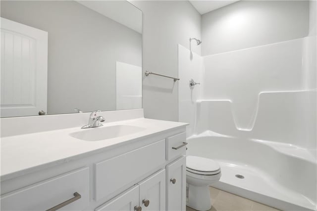 25275 W 148th Pl, Olathe, KS 66061 - bathroom with vanity, toilet, a shower, and tile patterned flooring
