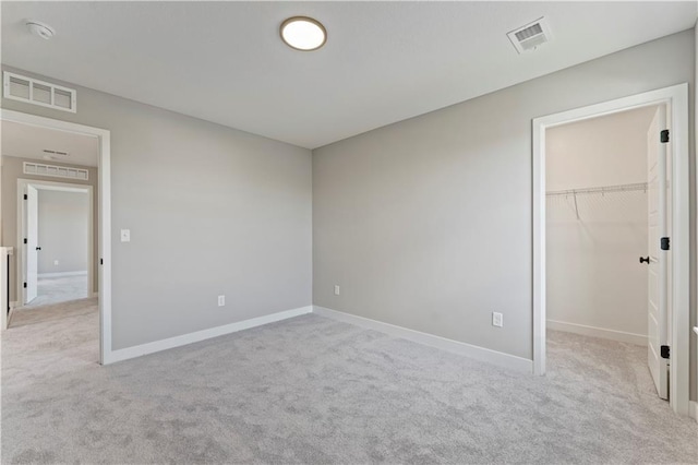 interior space featuring visible vents and carpet floors