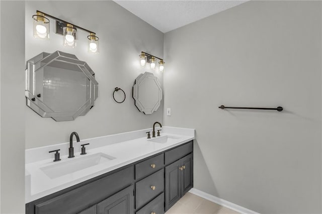 bathroom featuring tile patterned floors and vanity