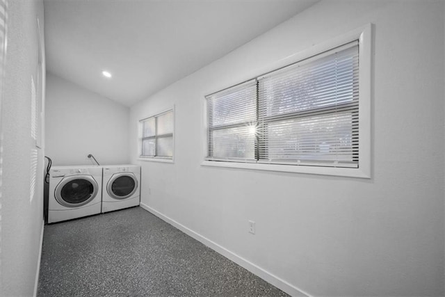 laundry room featuring laundry area, washer and clothes dryer, and baseboards