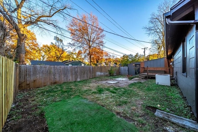 view of yard with a fenced backyard