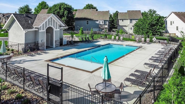 view of swimming pool with a patio area