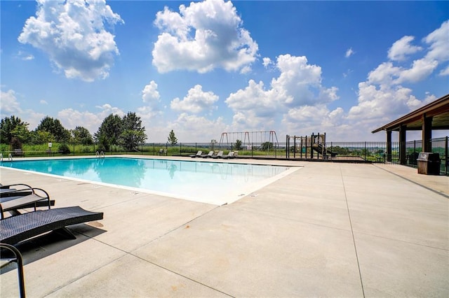 view of swimming pool featuring a patio area