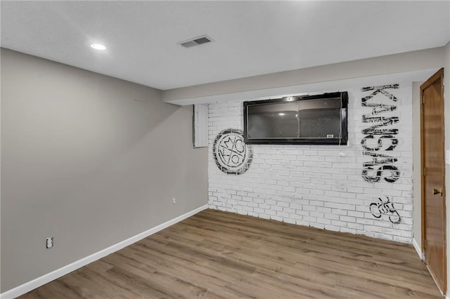 interior space featuring recessed lighting, visible vents, baseboards, and wood finished floors