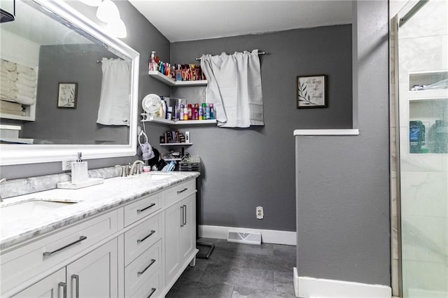 bathroom featuring vanity and walk in shower