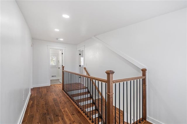 hallway featuring hardwood / wood-style flooring