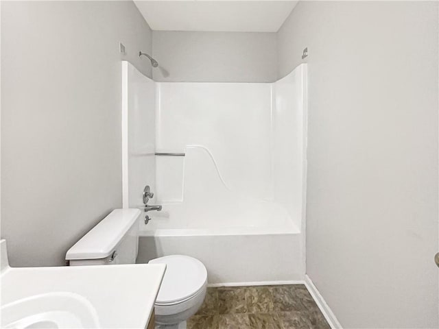 full bathroom featuring toilet, sink, and bathtub / shower combination