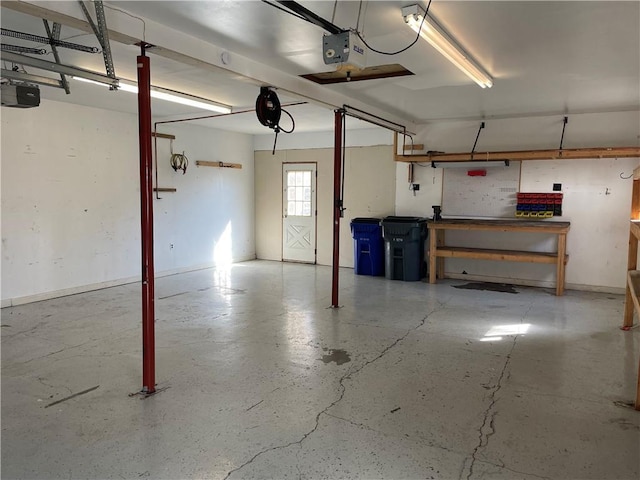 garage featuring a garage door opener