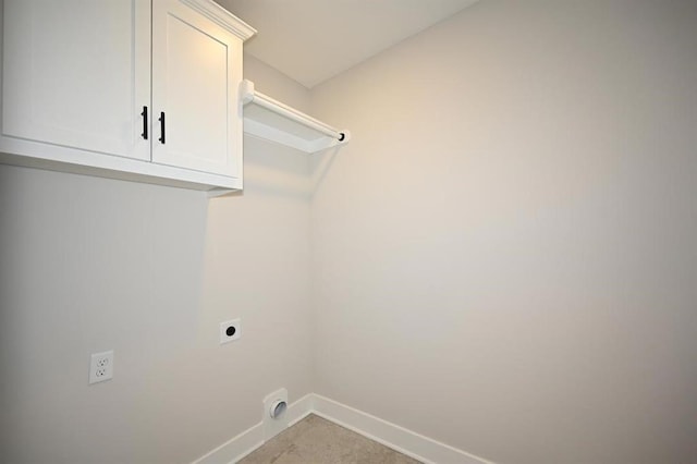 laundry area featuring cabinets and hookup for an electric dryer