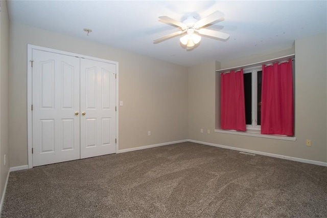 unfurnished bedroom with carpet and ceiling fan