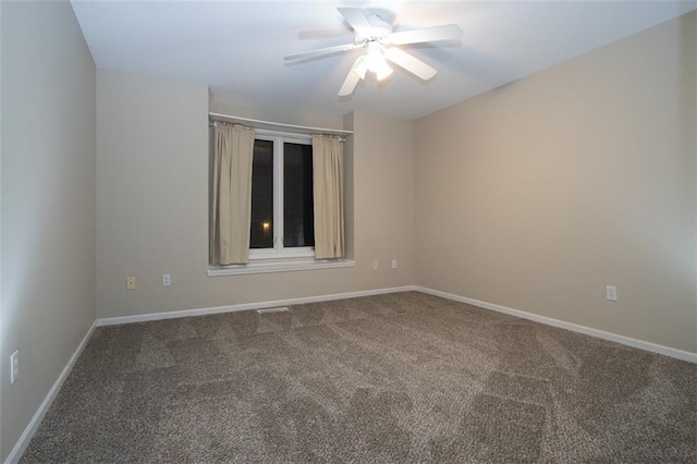 carpeted empty room with ceiling fan