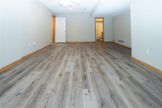 spare room with light hardwood / wood-style flooring