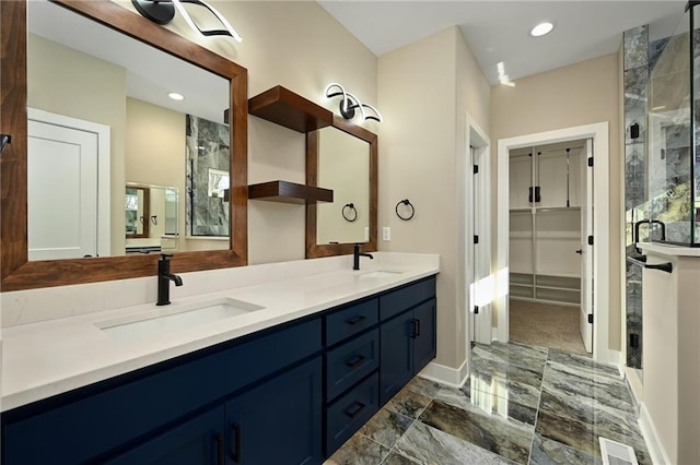 bathroom featuring vanity and walk in shower