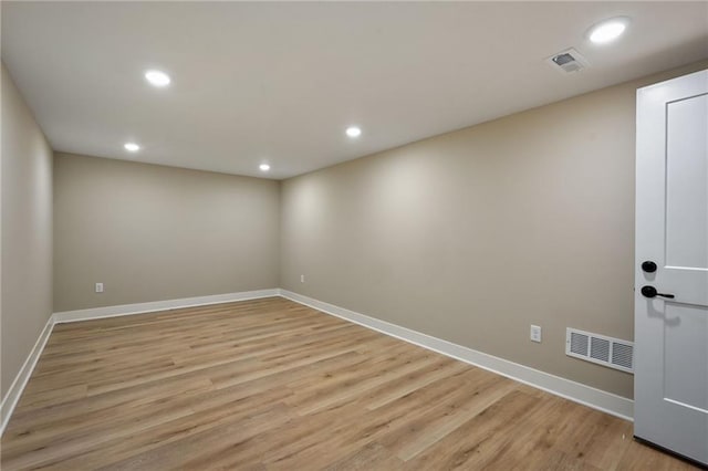 spare room with light wood-type flooring