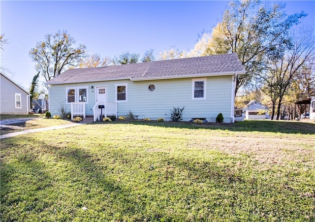 view of front of house with a front lawn