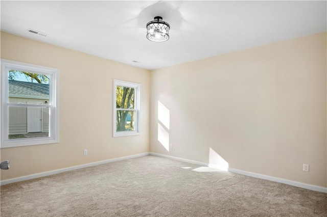 view of carpeted spare room