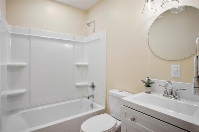 full bathroom with vanity, shower / bathtub combination, and toilet