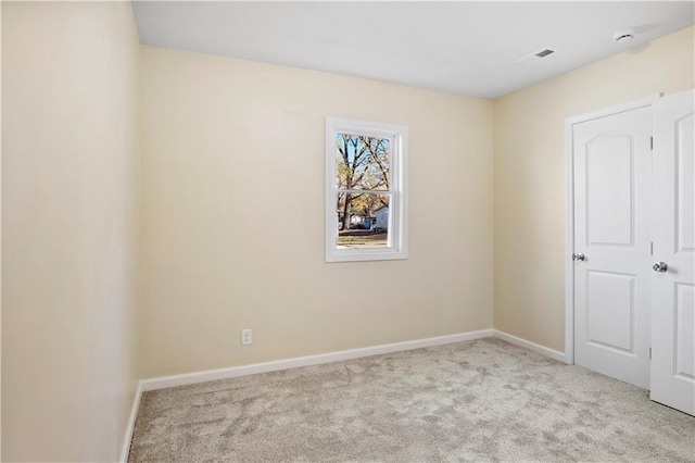 view of carpeted spare room