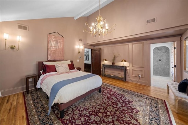 bedroom featuring high vaulted ceiling, beam ceiling, visible vents, and wood finished floors