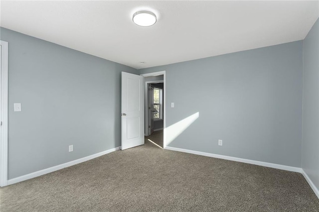 empty room with carpet floors