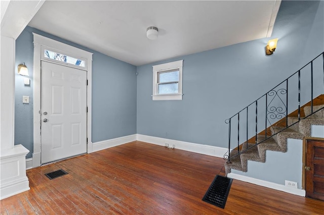 entrance foyer featuring hardwood / wood-style flooring