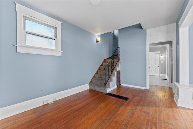 interior space with hardwood / wood-style floors