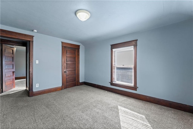 unfurnished bedroom with carpet flooring