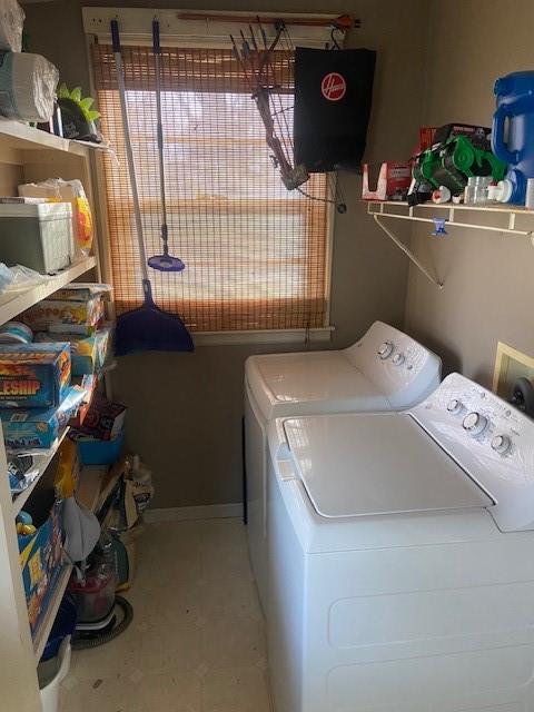 laundry area with separate washer and dryer