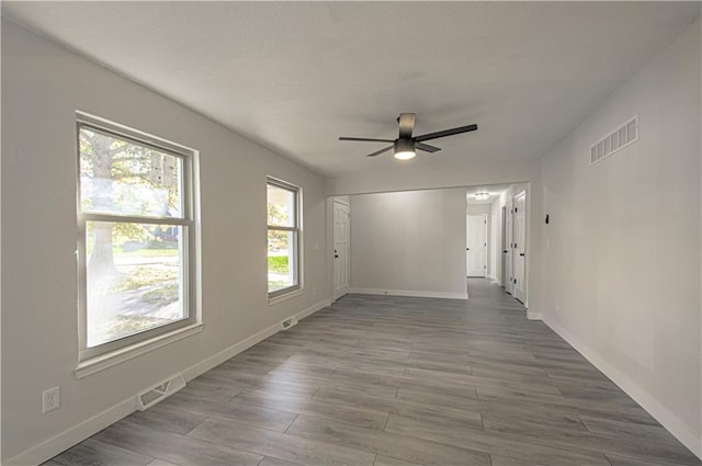 spare room featuring ceiling fan