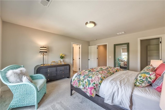 bedroom with carpet flooring and visible vents