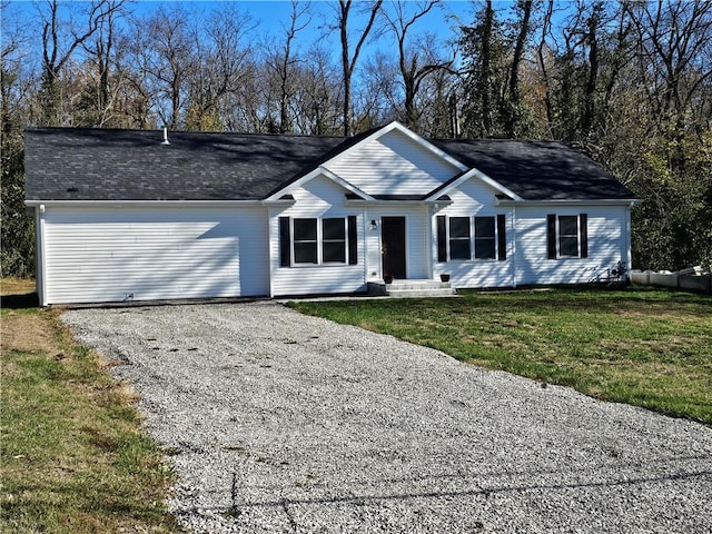 single story home with a front yard