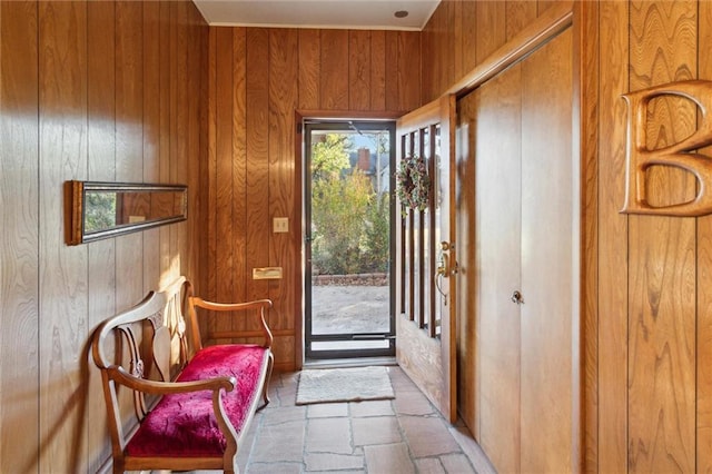 doorway with wooden walls