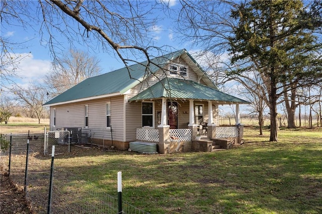 view of front facade featuring a porch and a front yard