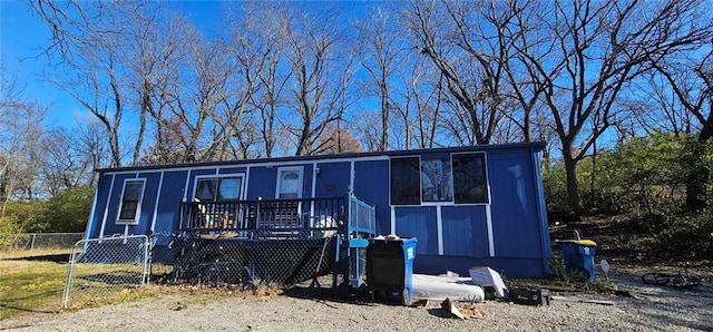 view of front facade featuring a deck