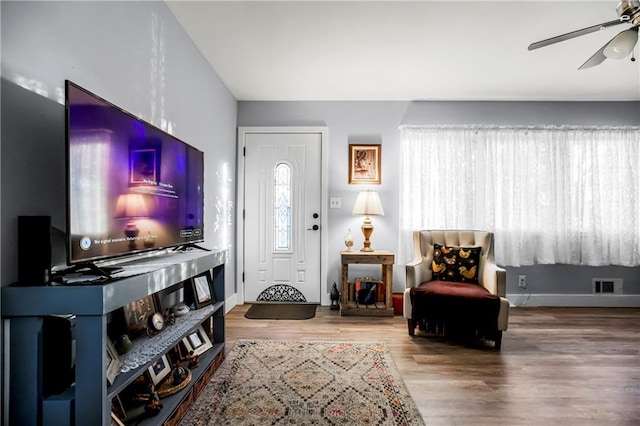 entryway featuring ceiling fan and wood-type flooring