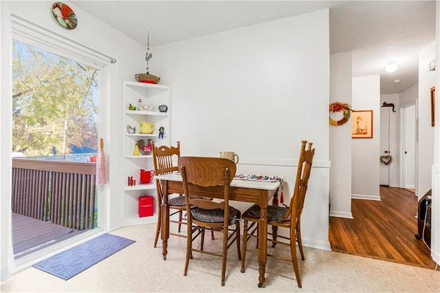 dining room with light hardwood / wood-style flooring