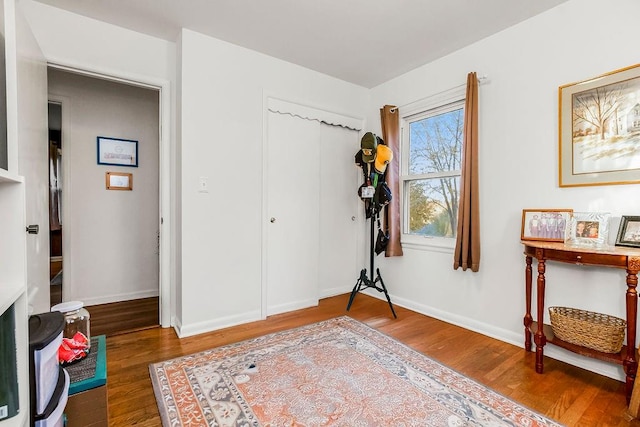 interior space with dark hardwood / wood-style flooring