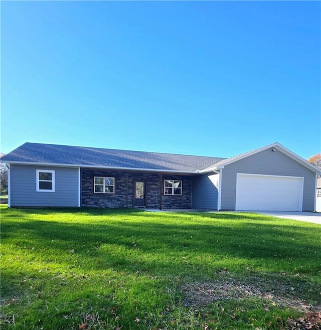 single story home featuring a front yard and a garage