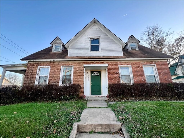 view of front of home with a front lawn