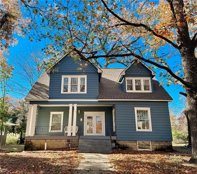 view of front of property featuring french doors and a porch