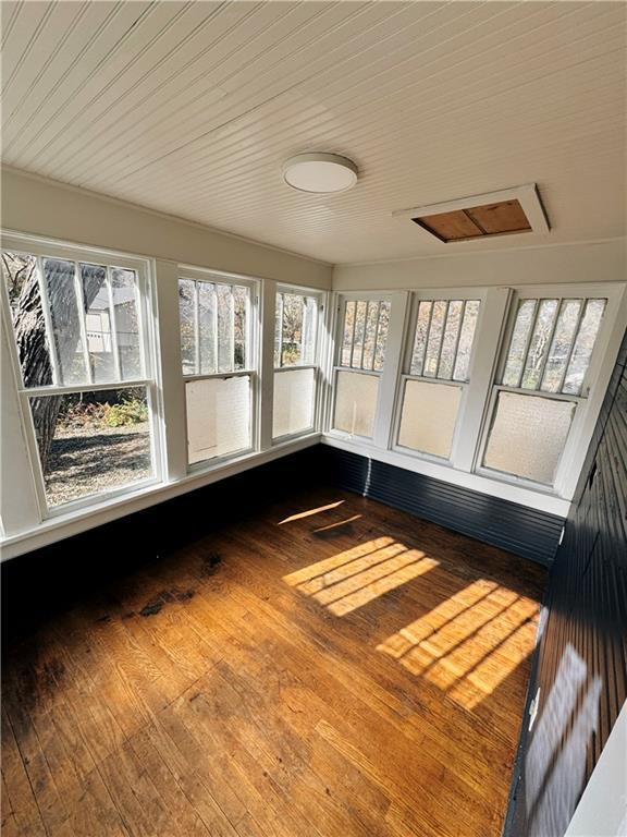 1610 S Olive St, Pittsburg, KS 66762 - unfurnished sunroom featuring plenty of natural light