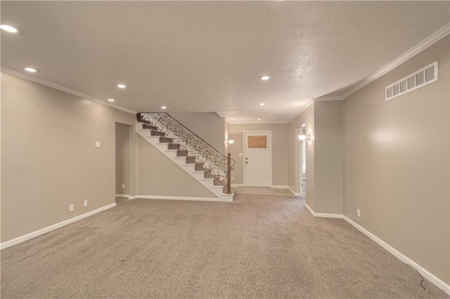 basement featuring crown molding and carpet floors