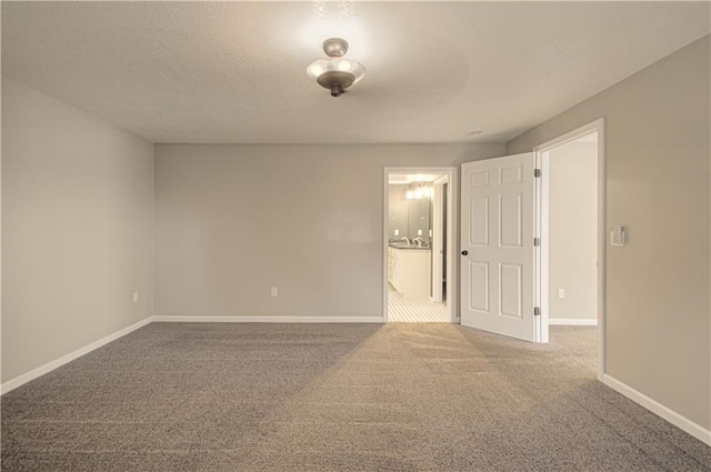 unfurnished room featuring carpet floors